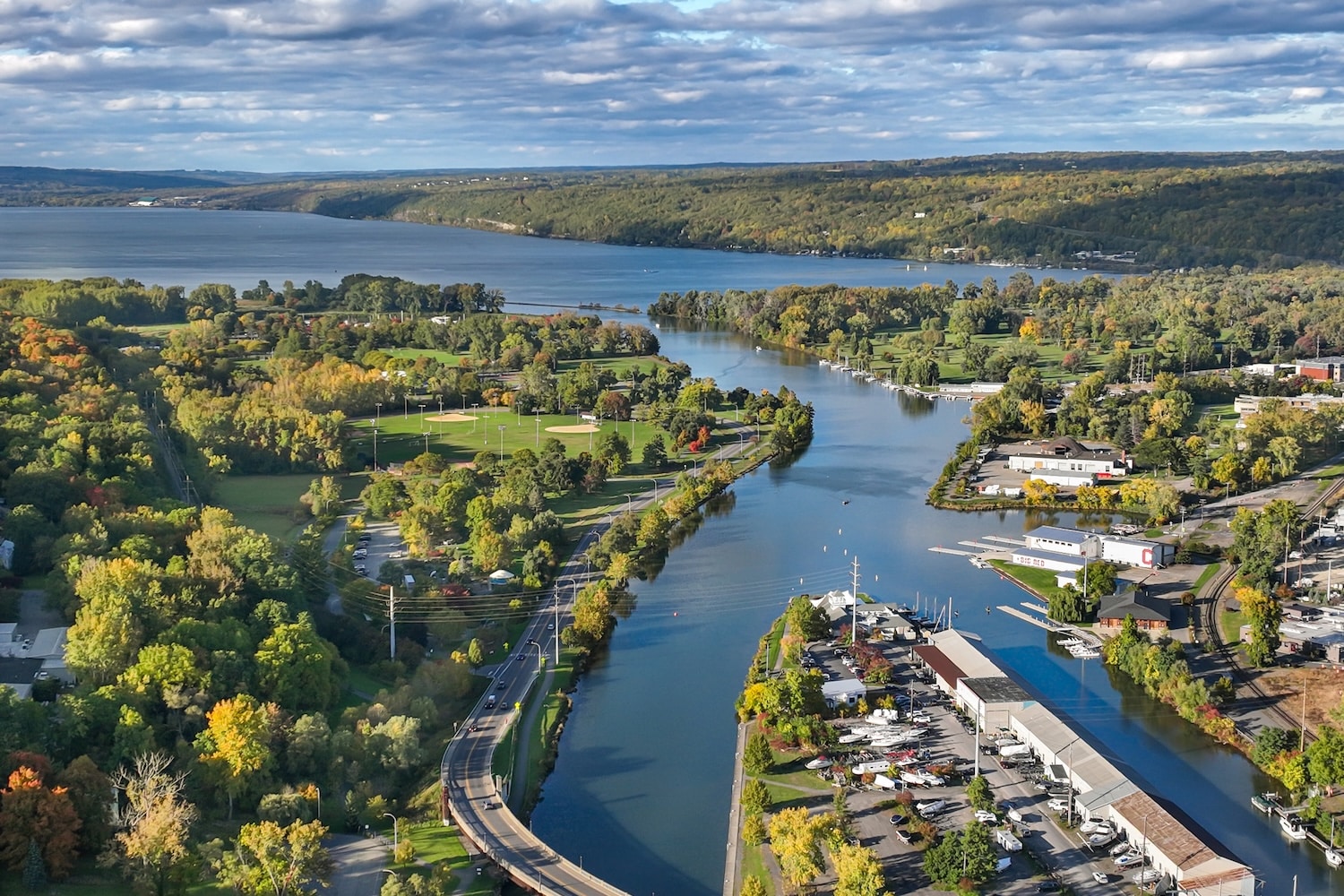Early afternoon autumn aerial photo view of Ithaca New York and Cayuga Lake.